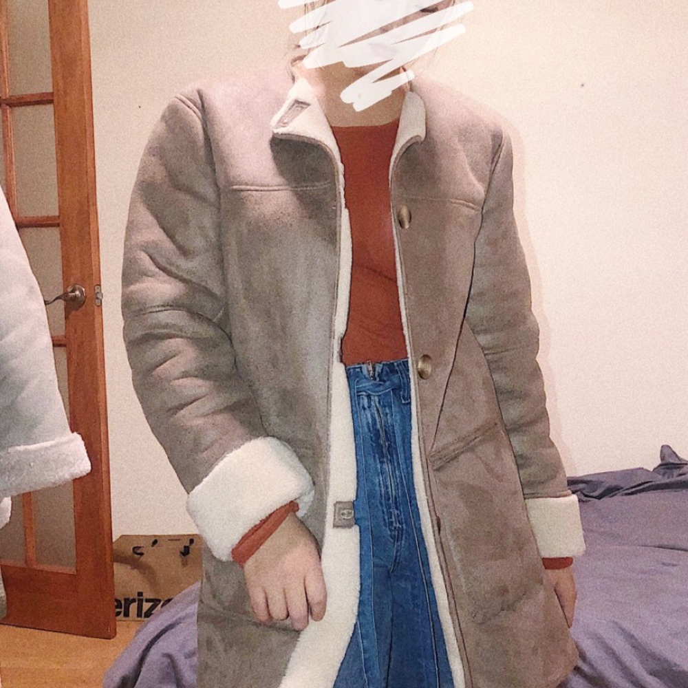 Brand new never worn Zara coat with fur inside.